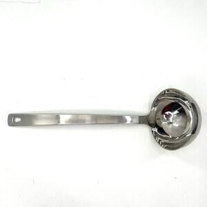 Williams Sonoma stainless Steel ladle with  hole for hanging